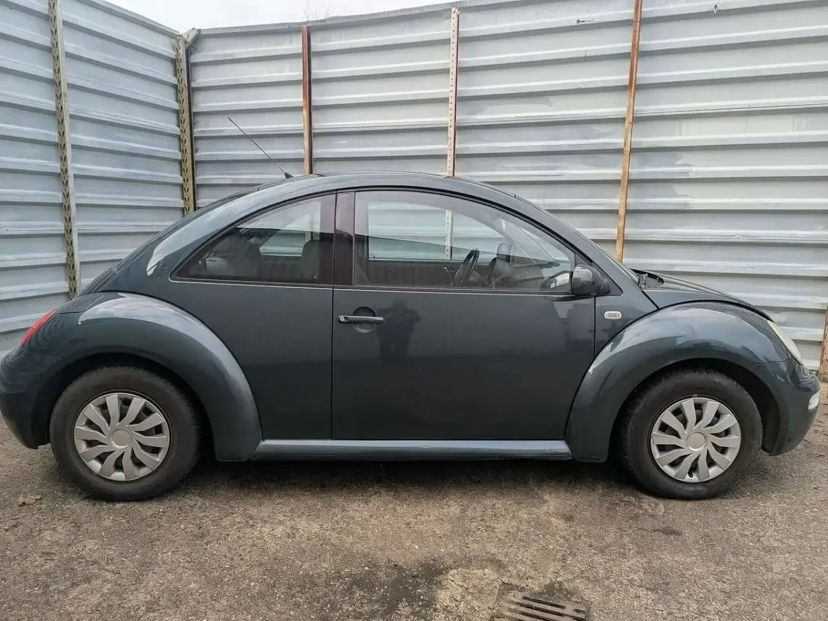 Gebraucht VW New Beetle Style 75 PS (55 kW) 2003 Grün (metallic) Kleinwagen