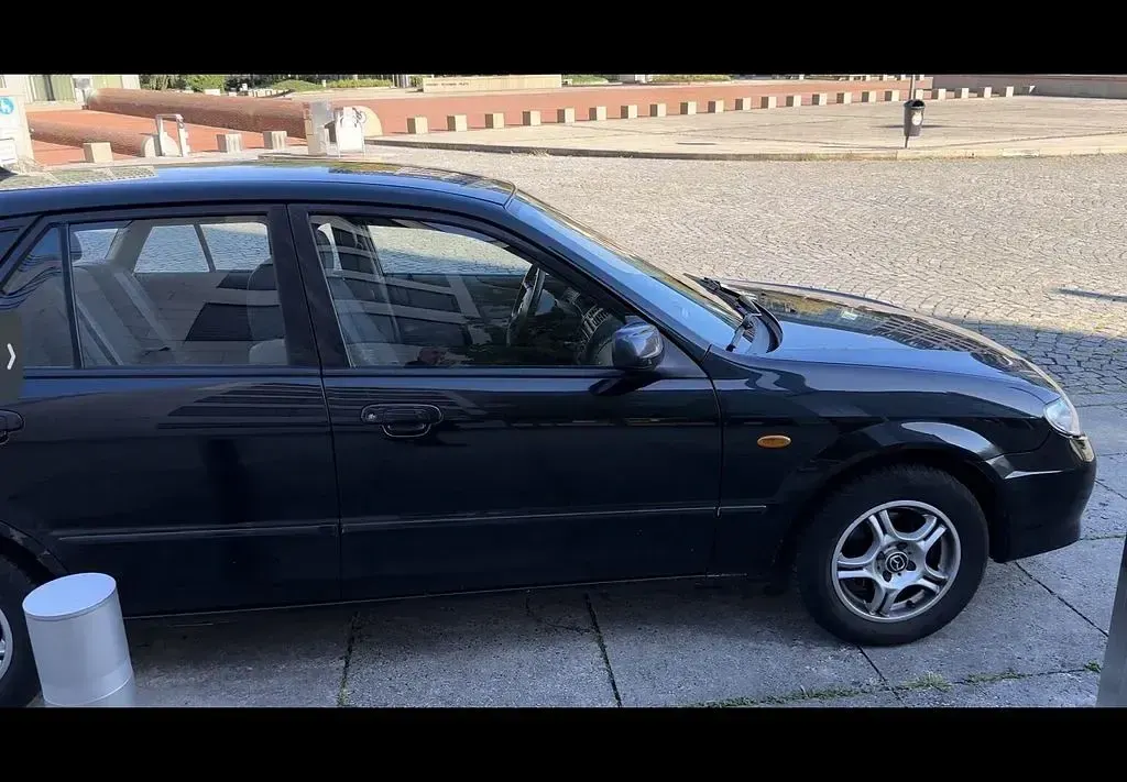 Gebraucht Mazda 323F Sportive 98 PS (72 kW) 2001 Schwarz Limousine