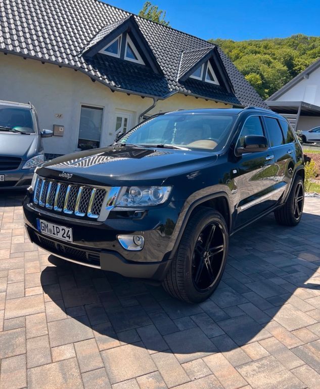 Schwarz Gebraucht 2013 Jeep Grand Cherokee Summit SUV | 16.500 € (Teuer) - Bild 1/4