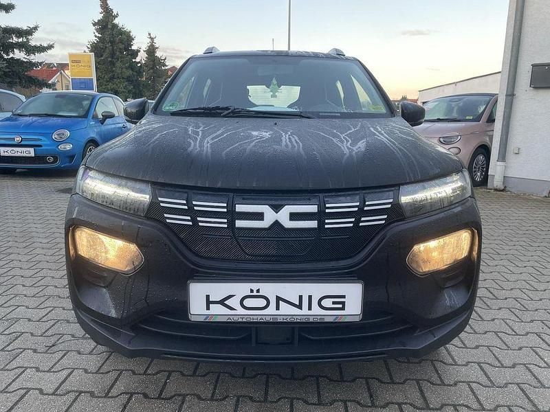 Gebraucht Dacia Spring Essentiel 19 kW (26 PS) 2023 Magmaschwarz Kleinwagen
