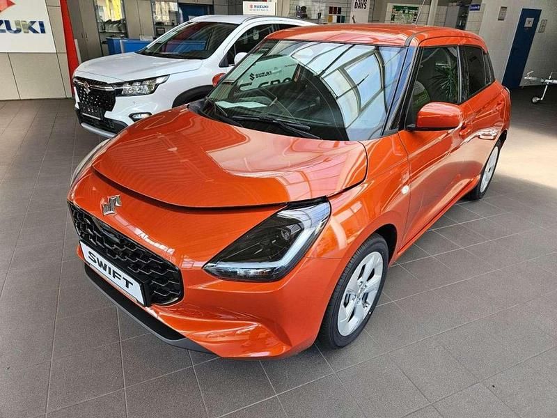 Orange Neu 2025 Suzuki Swift Comfort Kleinwagen | 18.990 € - Bild 1/4