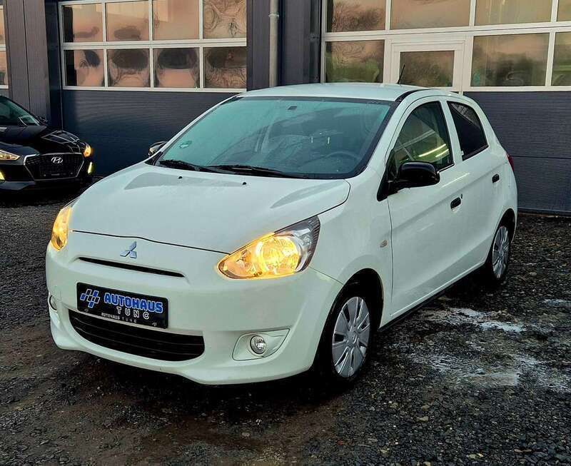Islandweiss (s) Gebraucht 2015 Mitsubishi Space Star Classic Collection Kleinwagen | 5.500 € (Fairer Preis) - Bild 1/3