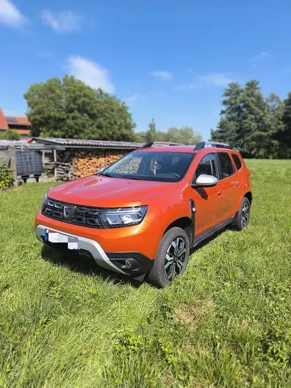 Używany Dacia Duster Extreme 101 KM (74 kW) 2022 Pomarańczowy SUV