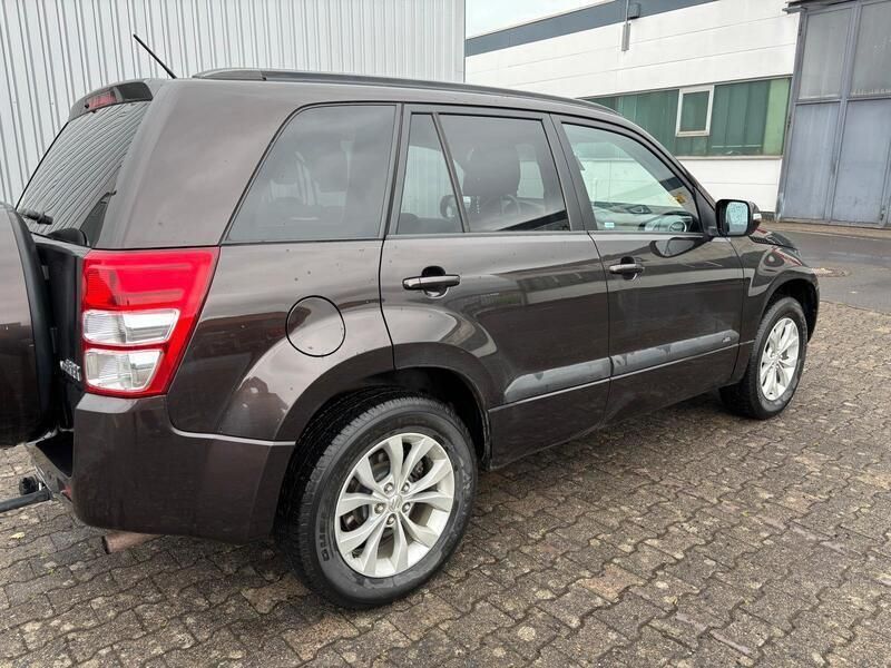 Braun Gebraucht 2013 Suzuki Grand Vitara SUV | 14.500 € - Bild 1/4