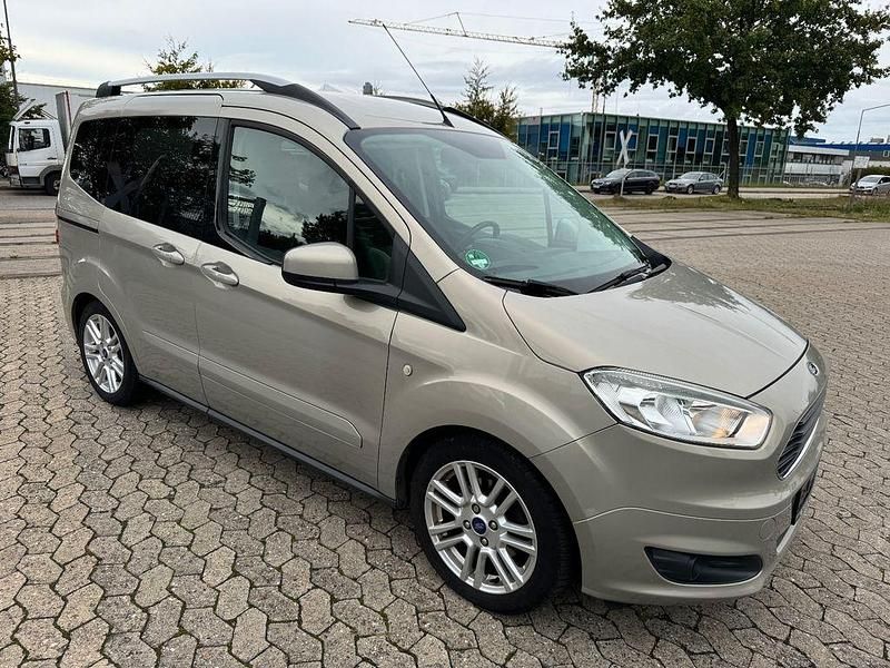 Gebraucht Ford Tourneo Courier Titanium 101 PS (74 kW) 2015 Tectonic silver Van / Kleinbus