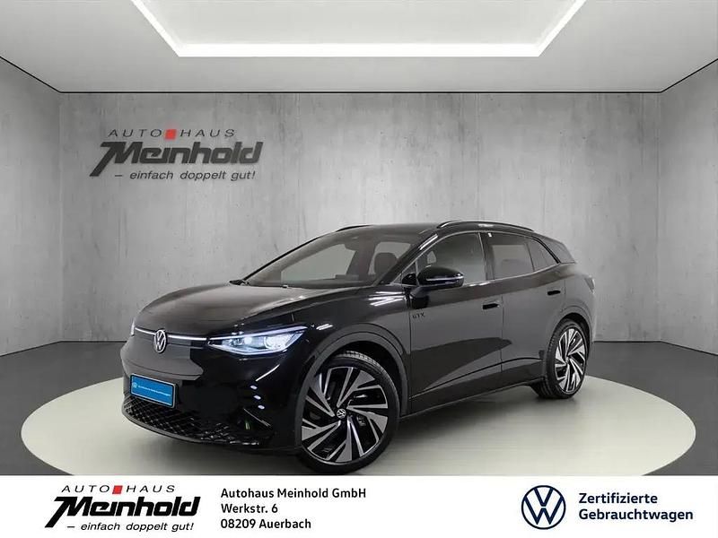 Grenadillschwarz metallic Gebraucht 2024 VW ID.4 GTX SUV | 48.888 € (Guter Preis) - Bild 1/4