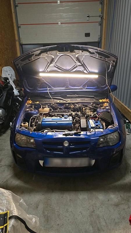 Używany MG ZR 103 KM (75 kW) 2005 Niebieski Hatchback