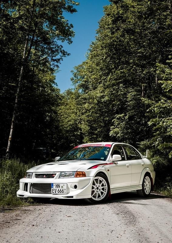 Second-hand Mitsubishi Lancer 280 CP (205 kW) 2000 Alb Berlinǎ