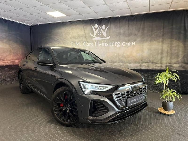 Grau Gebraucht 2023 Audi Q8 Sportback e-tron S-Line SUV | 51.900 € (Fairer Preis) - Bild 1/4