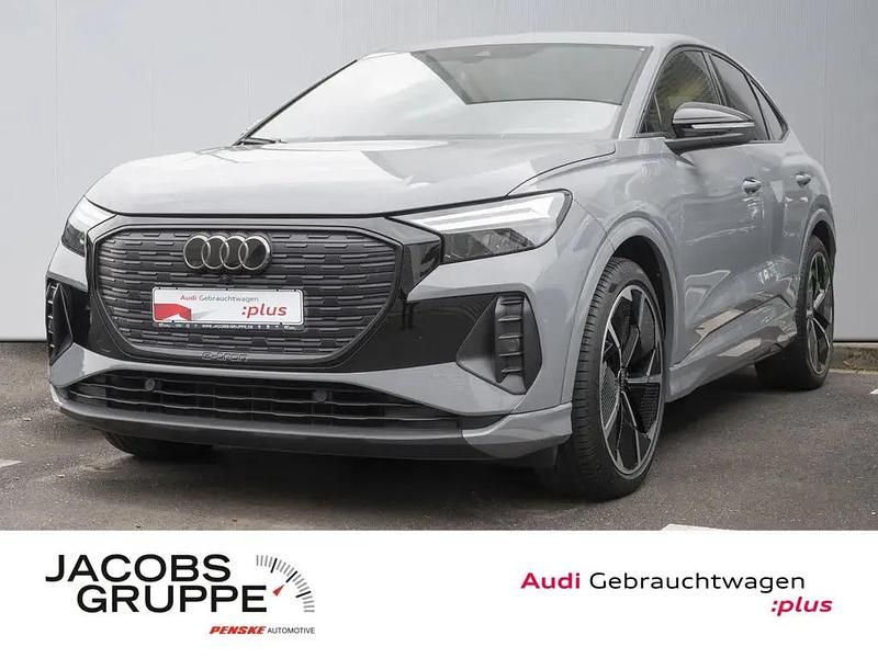 Grau Gebraucht 2022 Audi Q4 Sportback e-tron Advanced SUV | 28.430 € (Etwas zu teuer) - Bild 1/4
