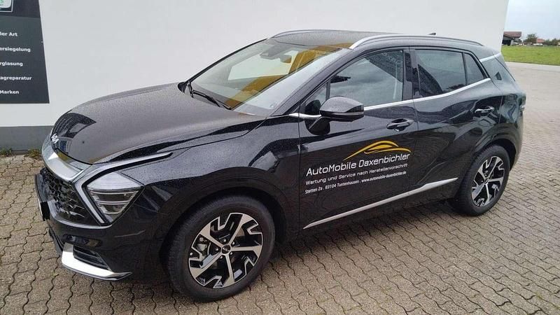 (1k) zilinaschwarz met. Gebraucht 2024 Kia Sportage Spirit SUV | 36.490 € (Guter Preis) - Bild 1/4