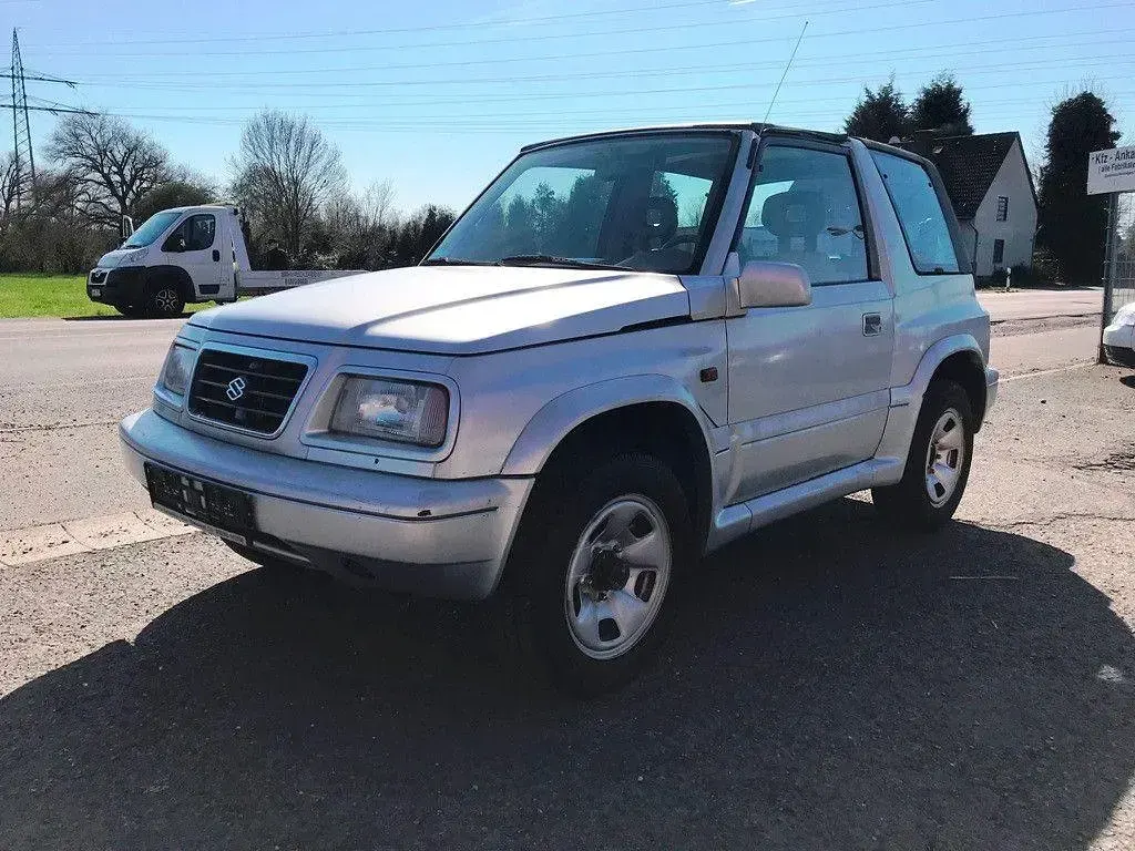 Gebraucht Suzuki Vitara 132 PS (97 kW) 1997 Silber SUV