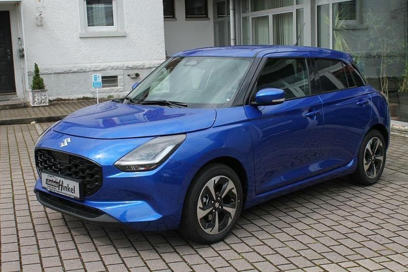 Blau Neu 2025 Suzuki Swift Comfort+ Limousine | 19.900 € - Bild 1/4