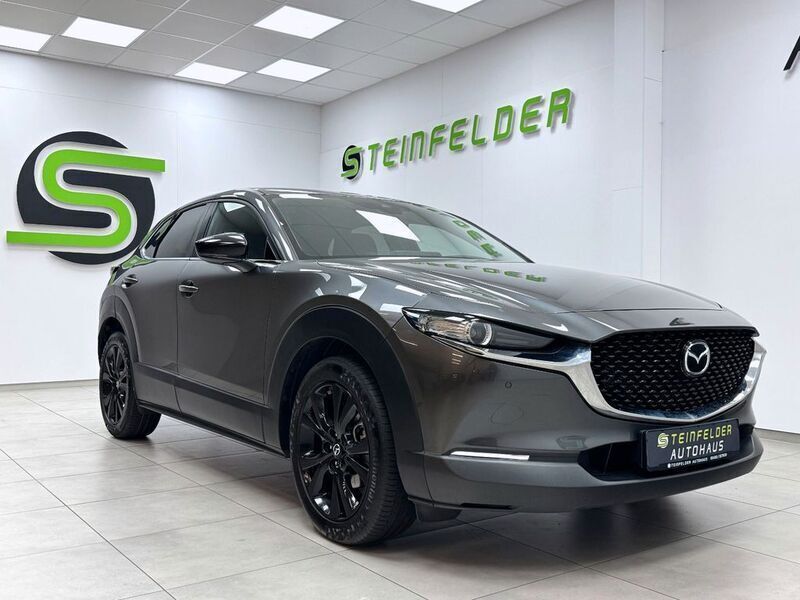 Machine gray Gebraucht 2022 Mazda CX-30 Homura-Line SUV | 24.490 € (Etwas zu teuer) - Bild 1/4