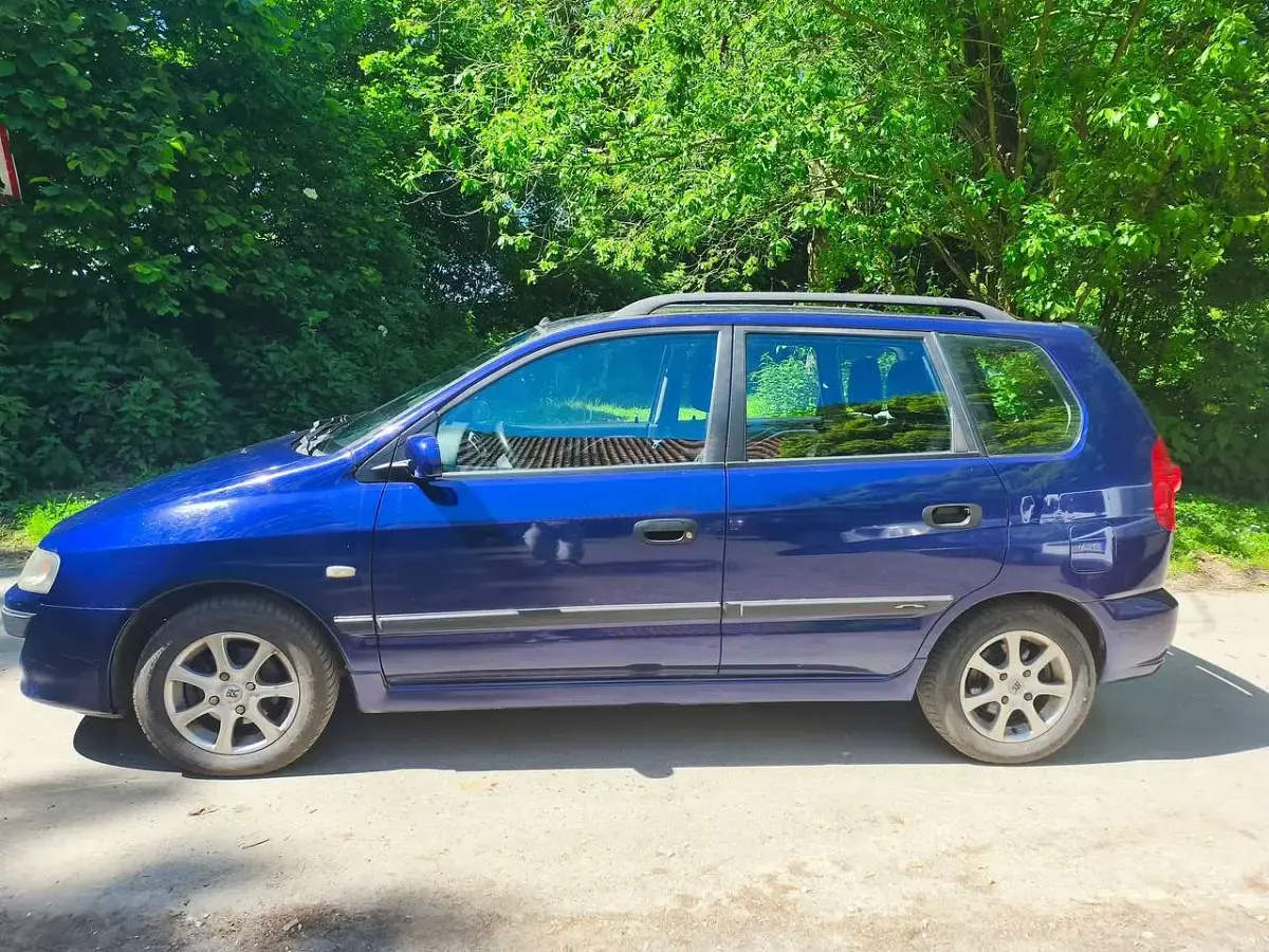 Begagnad Mitsubishi Space Star Motion 98 HK (72 kW) 2004 Blå Minibuss