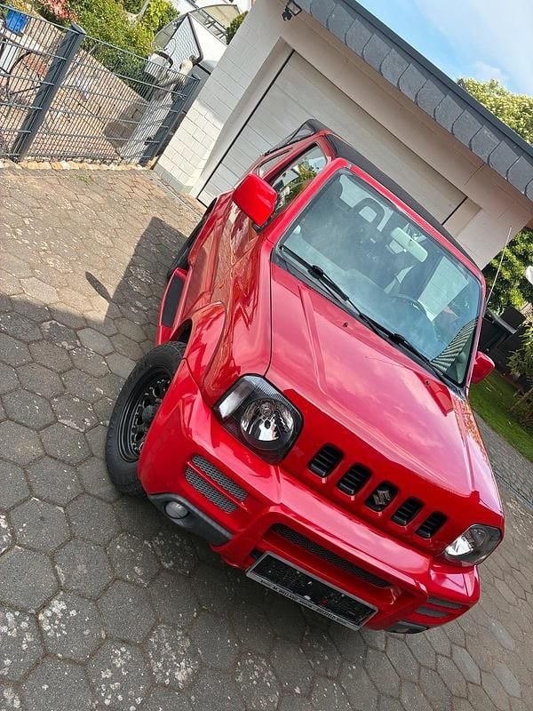 Rot Gebraucht 2007 Suzuki Jimny SUV | 8.500 € (Fairer Preis) - Bild 1/4