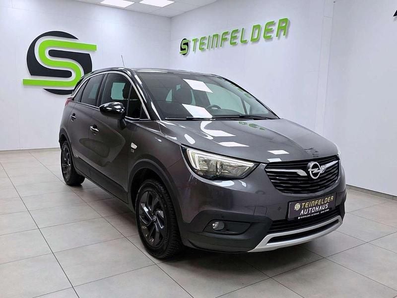 Mondstein grau/e:vulkan grau Gebraucht 2019 Opel Crossland X SUV | 10.990 € (Superpreis) - Bild 1/4