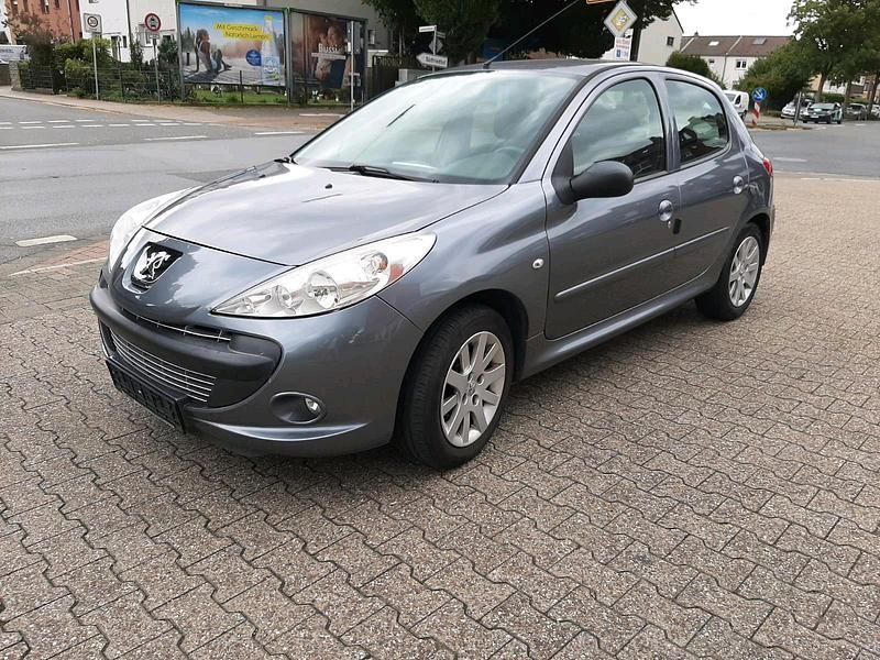 Grau Gebraucht 2009 Peugeot 206+ Kleinwagen | 2.700 € (Fairer Preis) - Bild 1/4