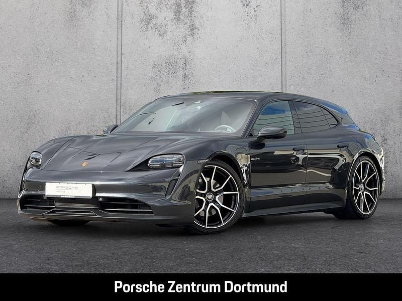 Vulkangraumetallic Gebraucht 2023 Porsche Taycan Sport Turismo Limousine | 66.450 € (Superpreis) - Bild 1/4