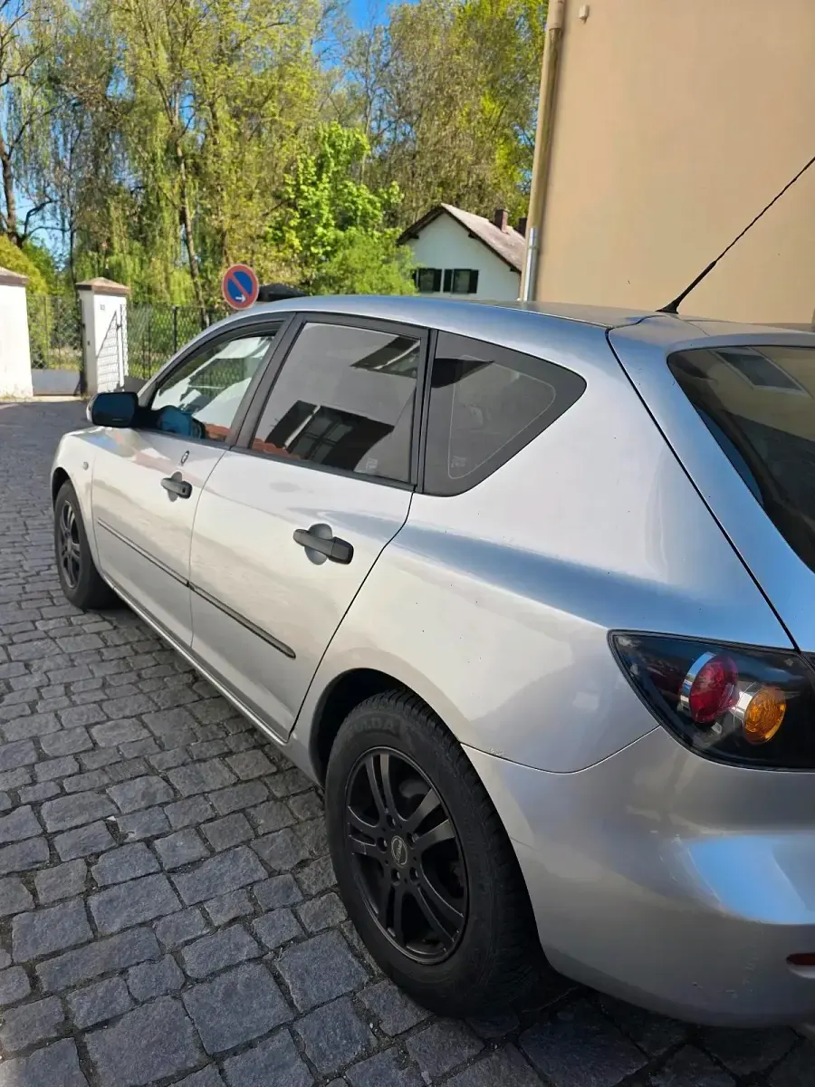 Używany Mazda 3 105 KM (77 kW) 2005 Szary Kombi