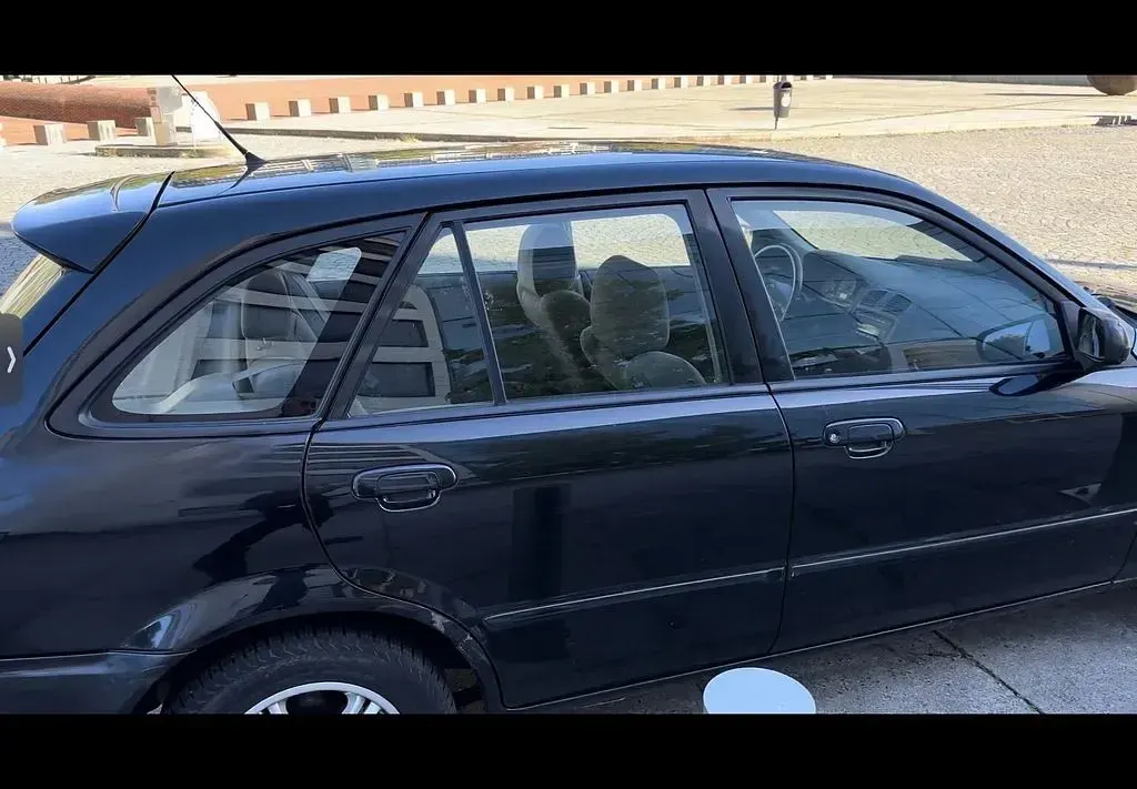 Gebraucht Mazda 323F Sportive 98 PS (72 kW) 2001 Schwarz Limousine