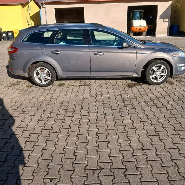Używany Ford Mondeo Titanium 160 KM (117 kW) 2012 Brązowy Sedan/Limuzyna