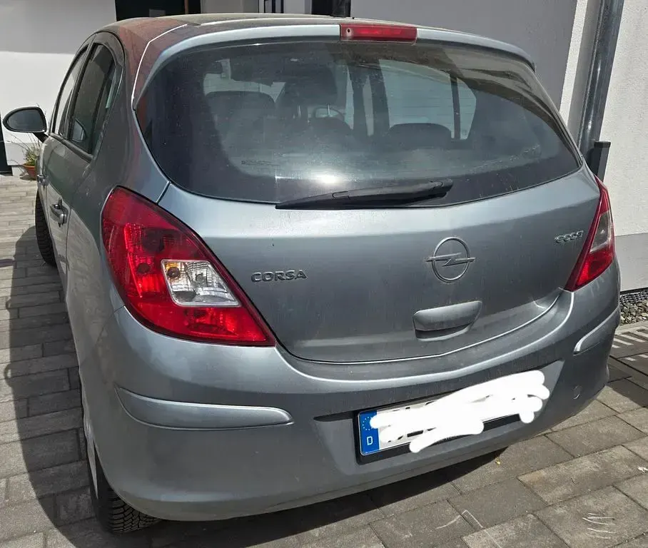 Używany Opel Corsa 75 KM (55 kW) 2010 Szary Hatchback