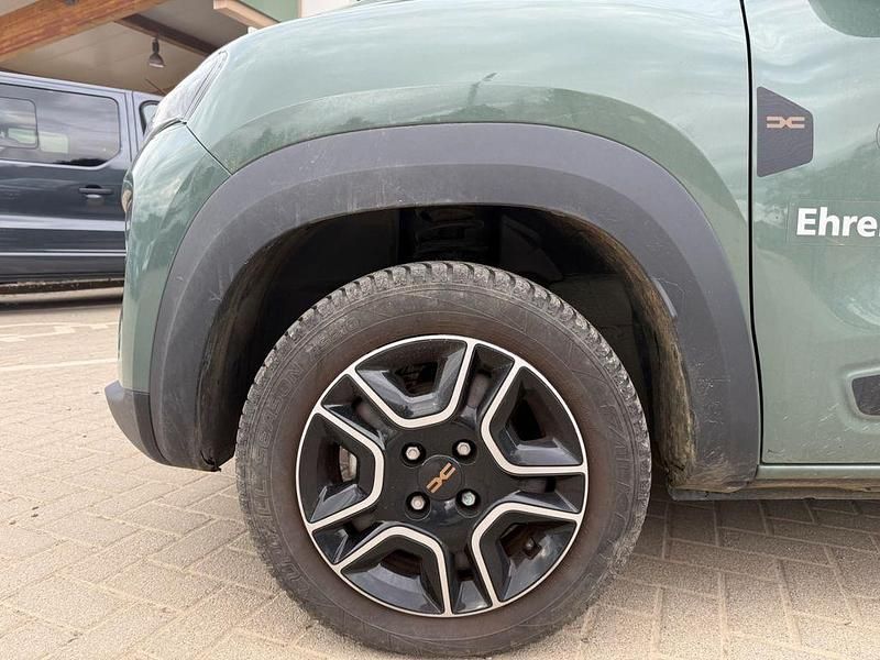 Gebraucht Dacia Spring Extreme 47 kW (65 PS) 2023 Grün flechtengrau Kleinwagen