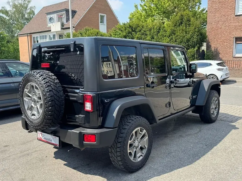 Gebraucht Jeep Wrangler Unlimited Rubicon 200 PS (147 kW) 2015 Schwarz SUV