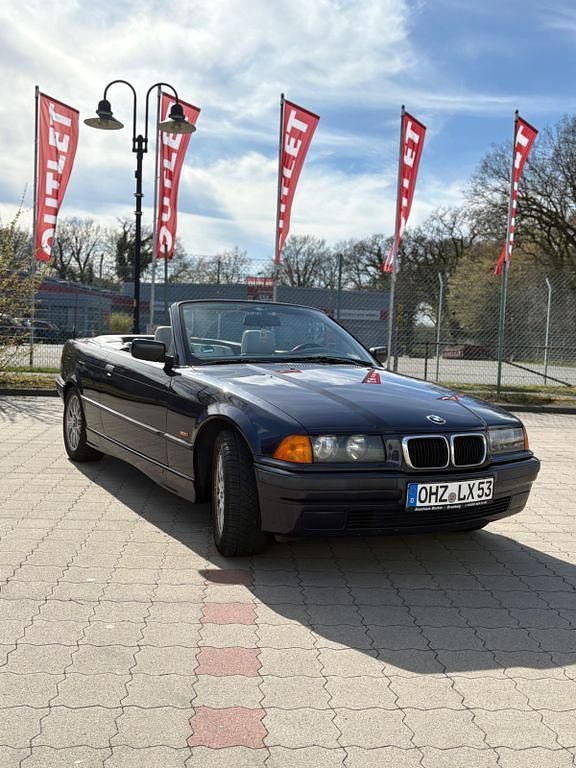 Gebraucht BMW 318 Cabriolet Basis 116 PS (85 kW) 1997 Violet Cabrio