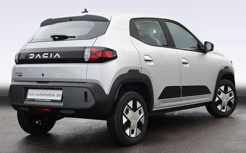Gebraucht Dacia Spring Expression 52 kW (71 PS) 2025 Lightninggrau (grau) Kleinwagen