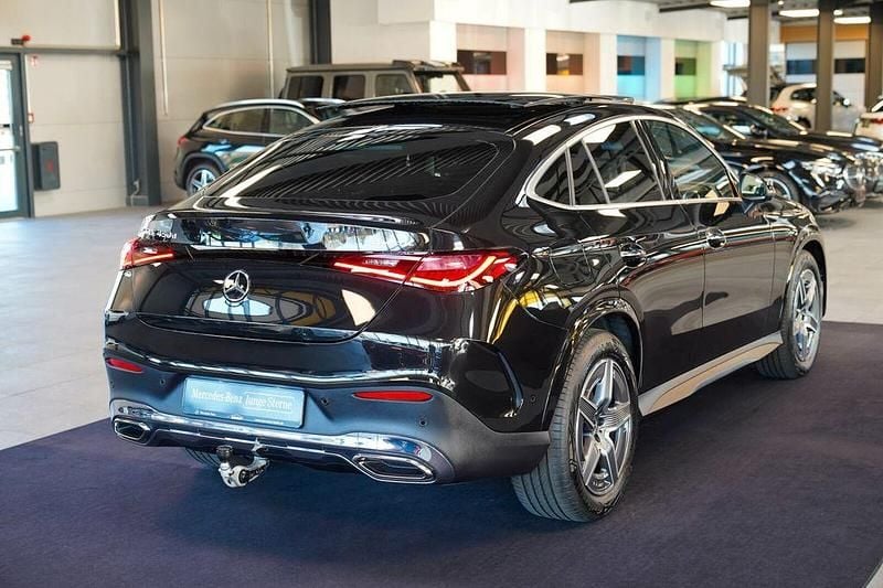 Gebraucht Mercedes GLC450 AMG line 367 PS (269 kW) 2024 Obsidianschwarz Coupé