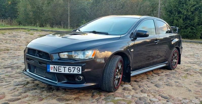 Braun Gebraucht 2011 Mitsubishi Lancer Limousine | 22.000 € (Fairer Preis) - Bild 1/4