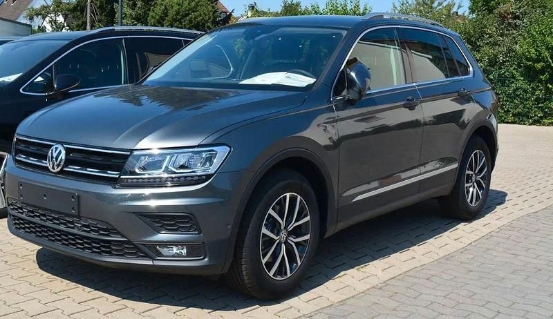 Grau Gebraucht 2020 VW Tiguan Comfortline SUV | 21.500 € (Superpreis) - Bild 1/2