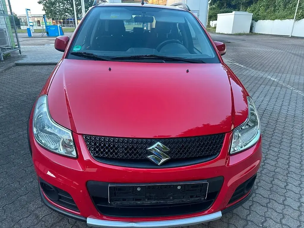 Gebraucht Suzuki SX4 120 PS (88 kW) 2013 Rot Limousine