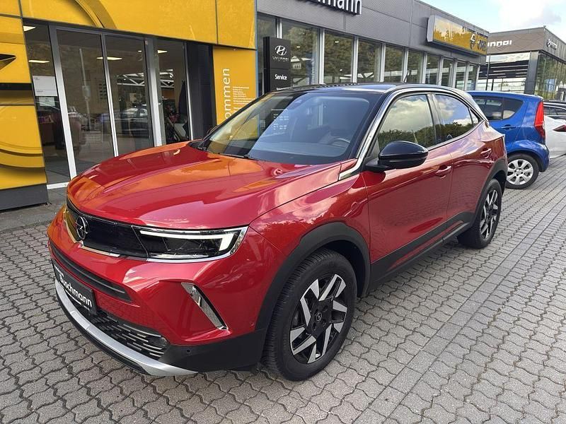 Kosmos rot metallic Gebraucht 2022 Opel Mokka Elegance SUV | 20.870 € (Fairer Preis) - Bild 1/4