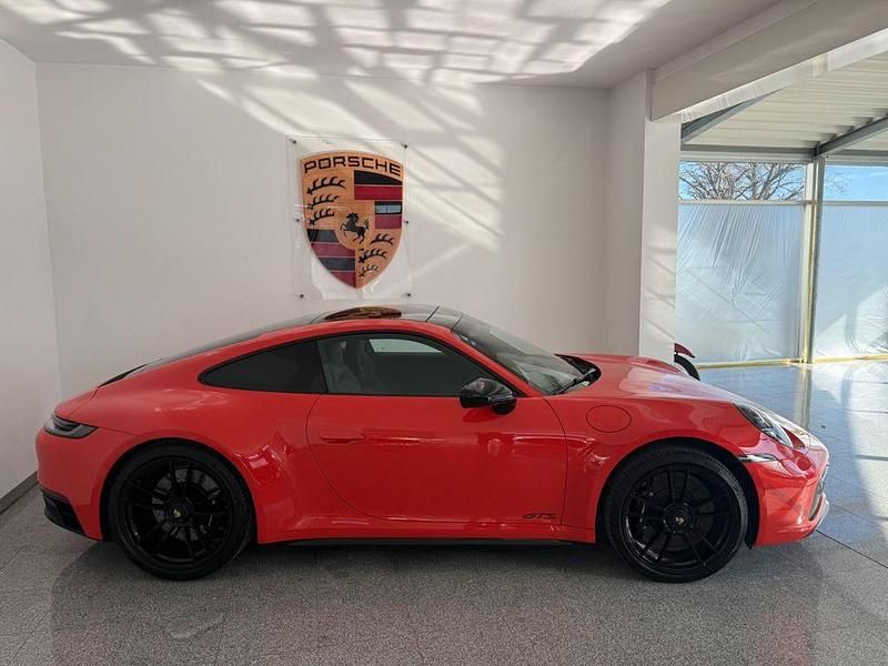 Gebraucht Porsche 992 480 PS (353 kW) 2022 Lavaorange Coupé