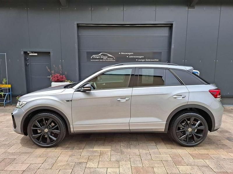 Pyritsilber Gebraucht 2024 VW T-Roc R-line SUV | 30.490 € (Fairer Preis) - Bild 1/4