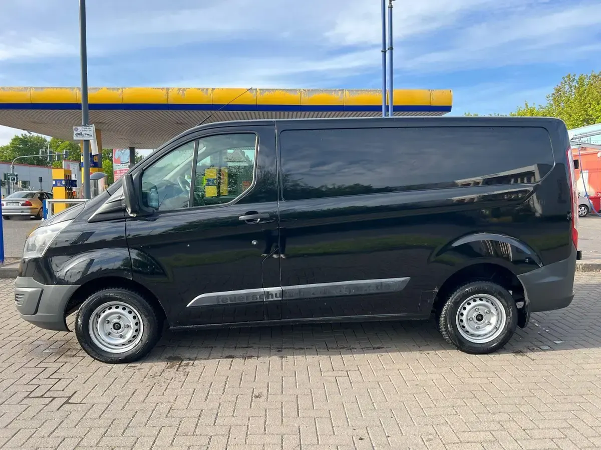 Używany Ford Transit 101 KM (74 kW) 2013 Czarny Minivan