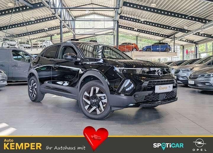 Black metallic Gebraucht 2024 Opel Mokka SUV | 22.350 € (Fairer Preis) - Bild 1/4