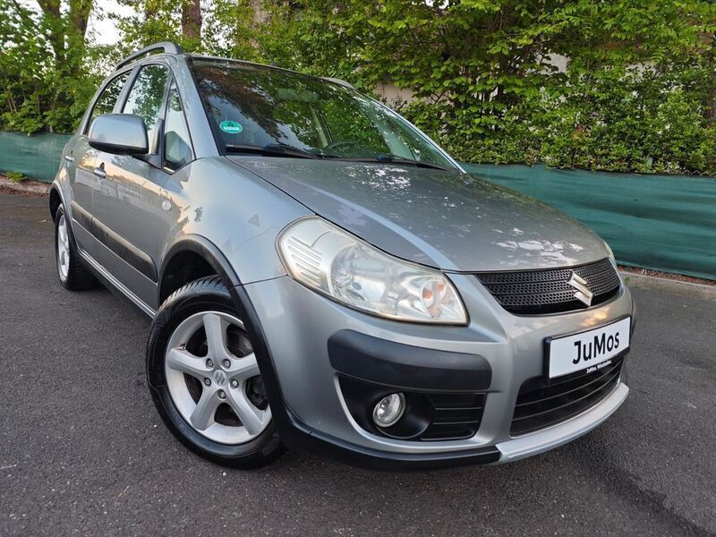 Grau Gebraucht 2007 Suzuki SX4 Comfort Limousine | 4.450 € (Fairer Preis) - Bild 1/4