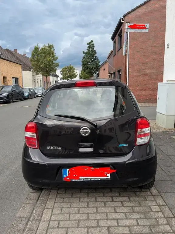 Gebraucht Nissan Micra 80 PS (58 kW) 2011 Schwarz Kleinwagen