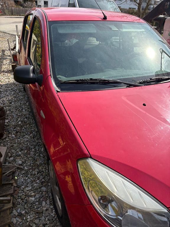 Gebraucht Dacia Sandero Ambiance 75 PS (55 kW) 2009 Rot Limousine