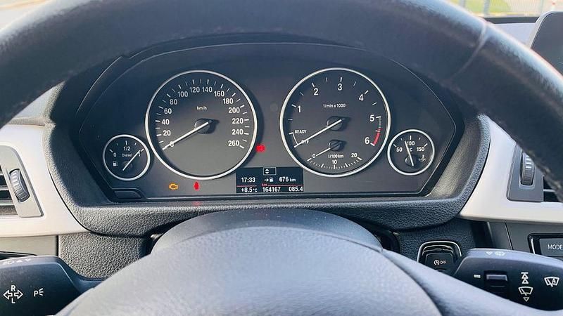 Second-hand BMW 320 Performance 184 CP (135 kW) 2014 Negru Berlinǎ