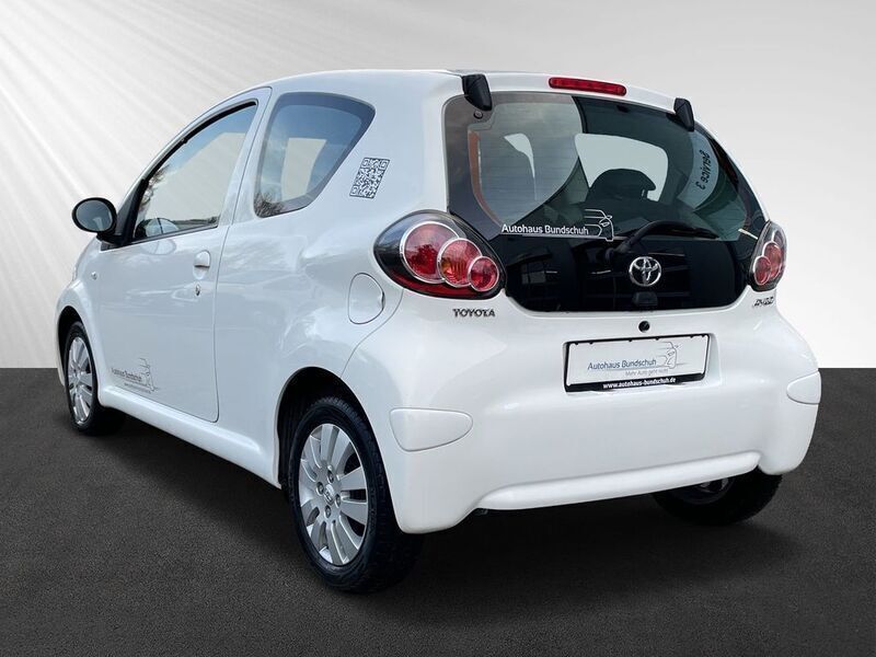 Gebraucht Toyota Aygo Cool 68 PS (50 kW) 2013 Pianosaweiß Kleinwagen
