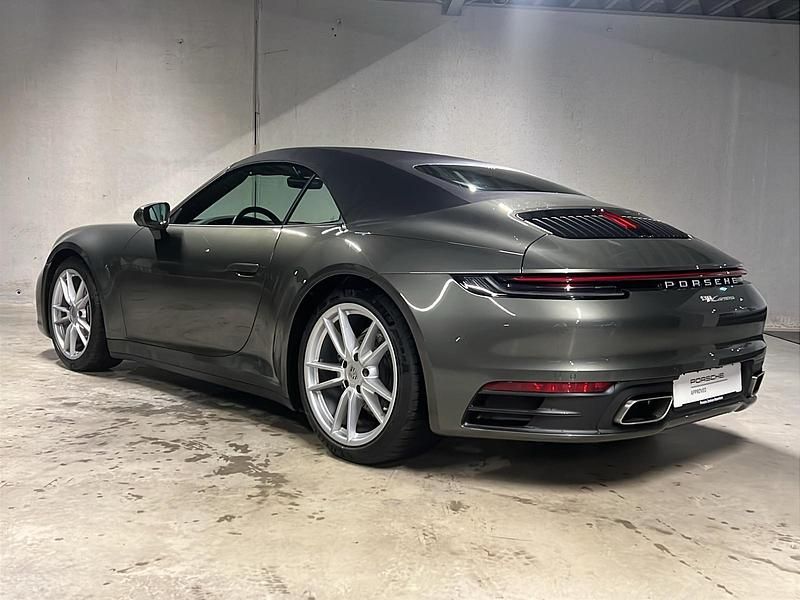 Gebraucht Porsche 911 Carrera 385 PS (283 kW) 2024 Aventuringrünmetallic Cabrio
