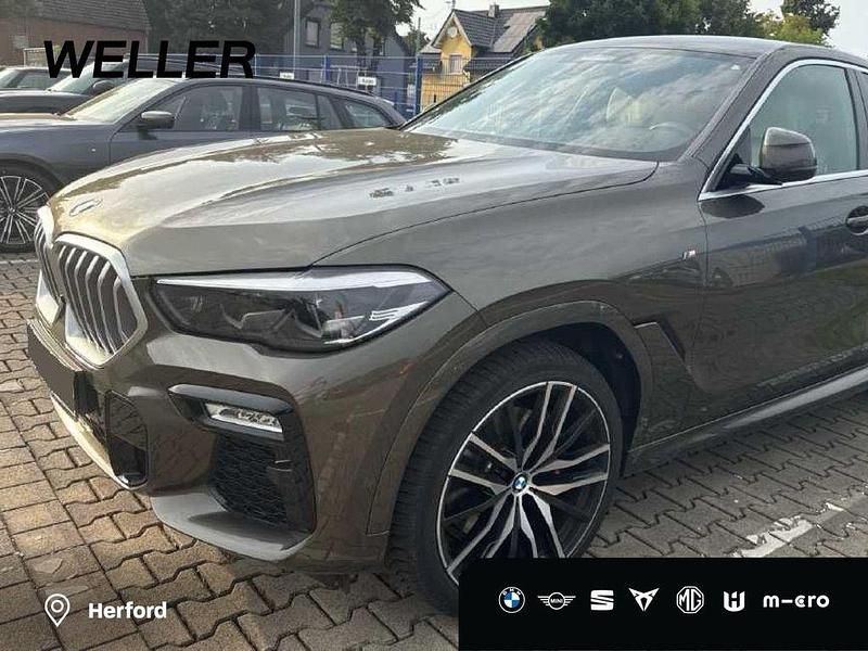 Manhattan green (grün) Gebraucht 2021 BMW X6 M Sport SUV | 59.950 € (Fairer Preis) - Bild 1/4