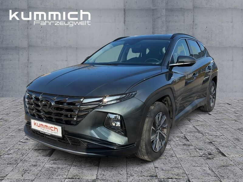 Amazon grey (grau) Gebraucht 2021 Hyundai Tucson Select SUV | 26.990 € (Fairer Preis) - Bild 1/4