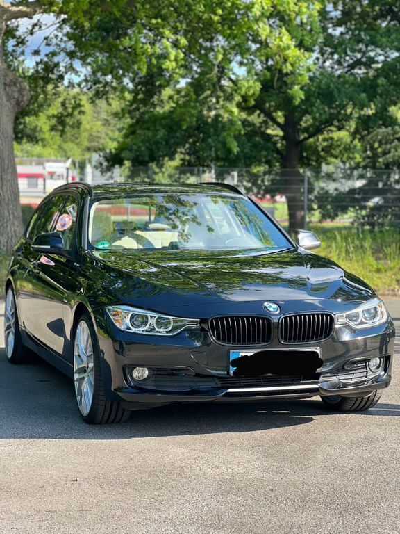 Schwarz Gebraucht 2013 BMW 320 Performance Kombi | 12.350 € (Fairer Preis) - Bild 1/4