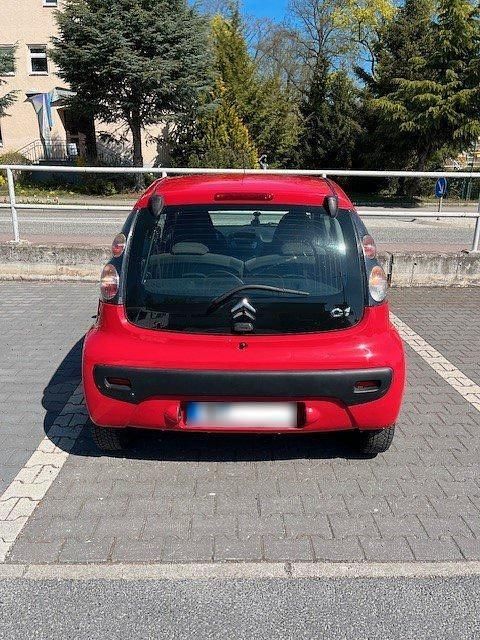 Second-hand Citroën C1 68 CP (50 kW) 2006 Roșu Hatchback